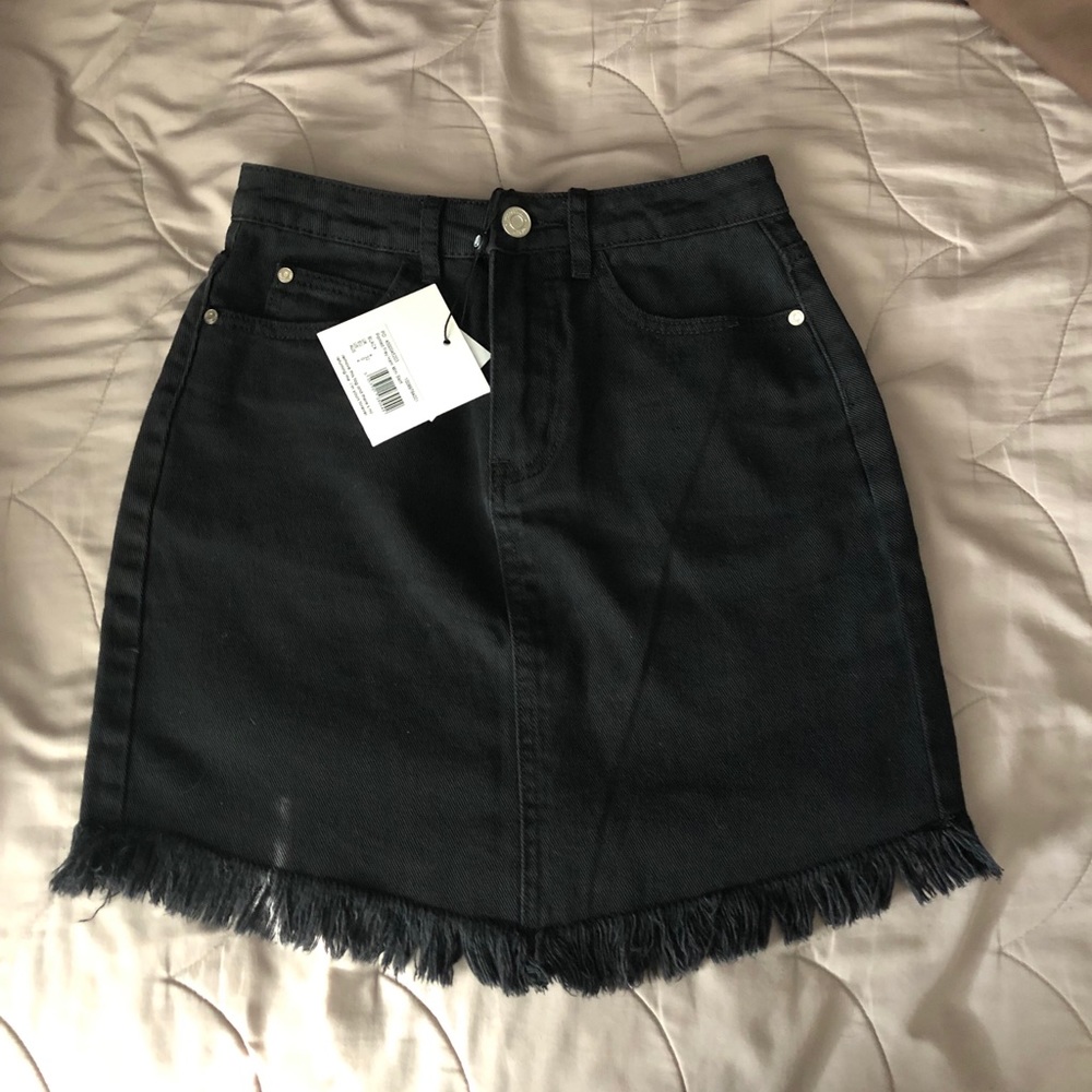 Distressed black skirt